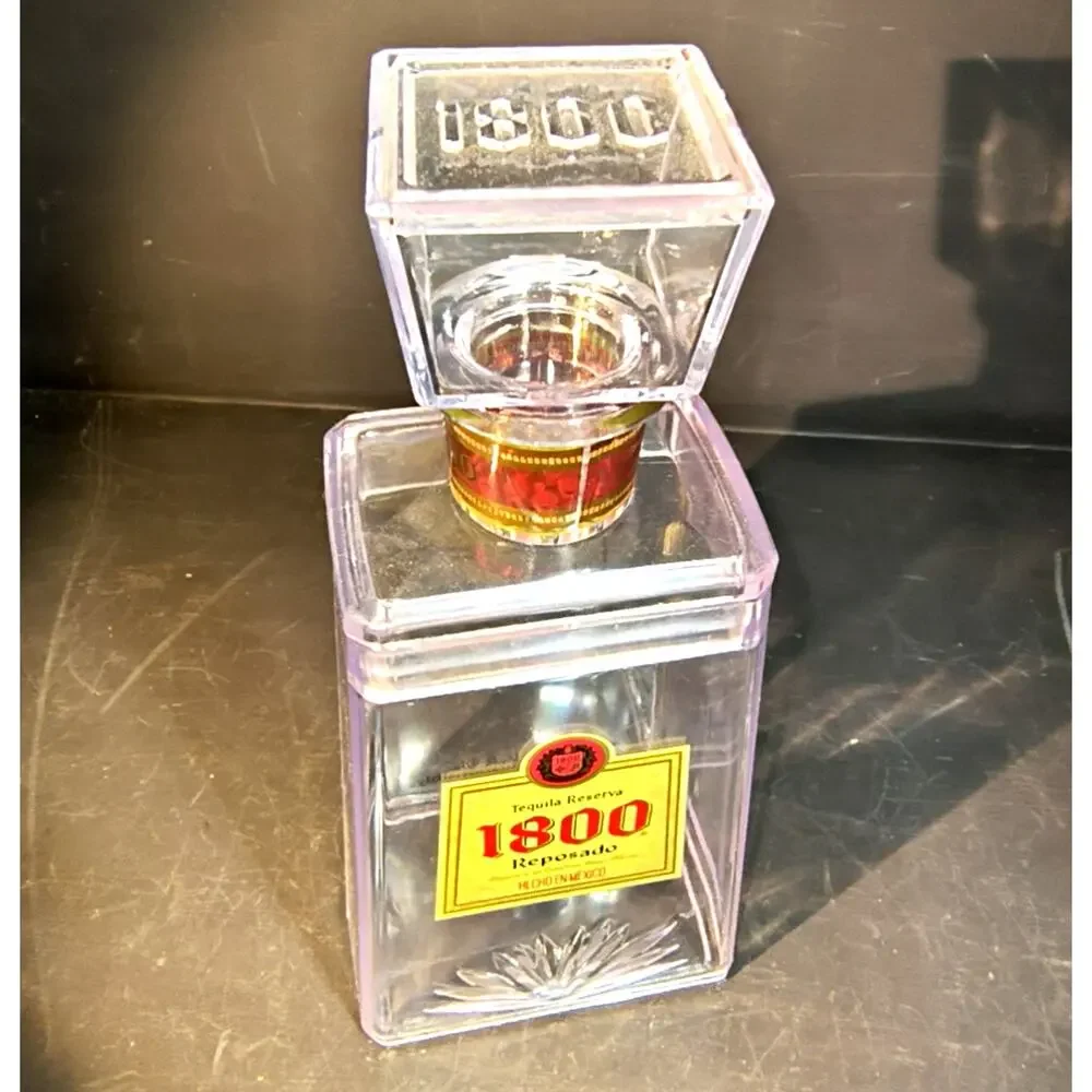 1763.  Empty Plastic Point of Sale Display Bottle 1800 Tequila Reposado